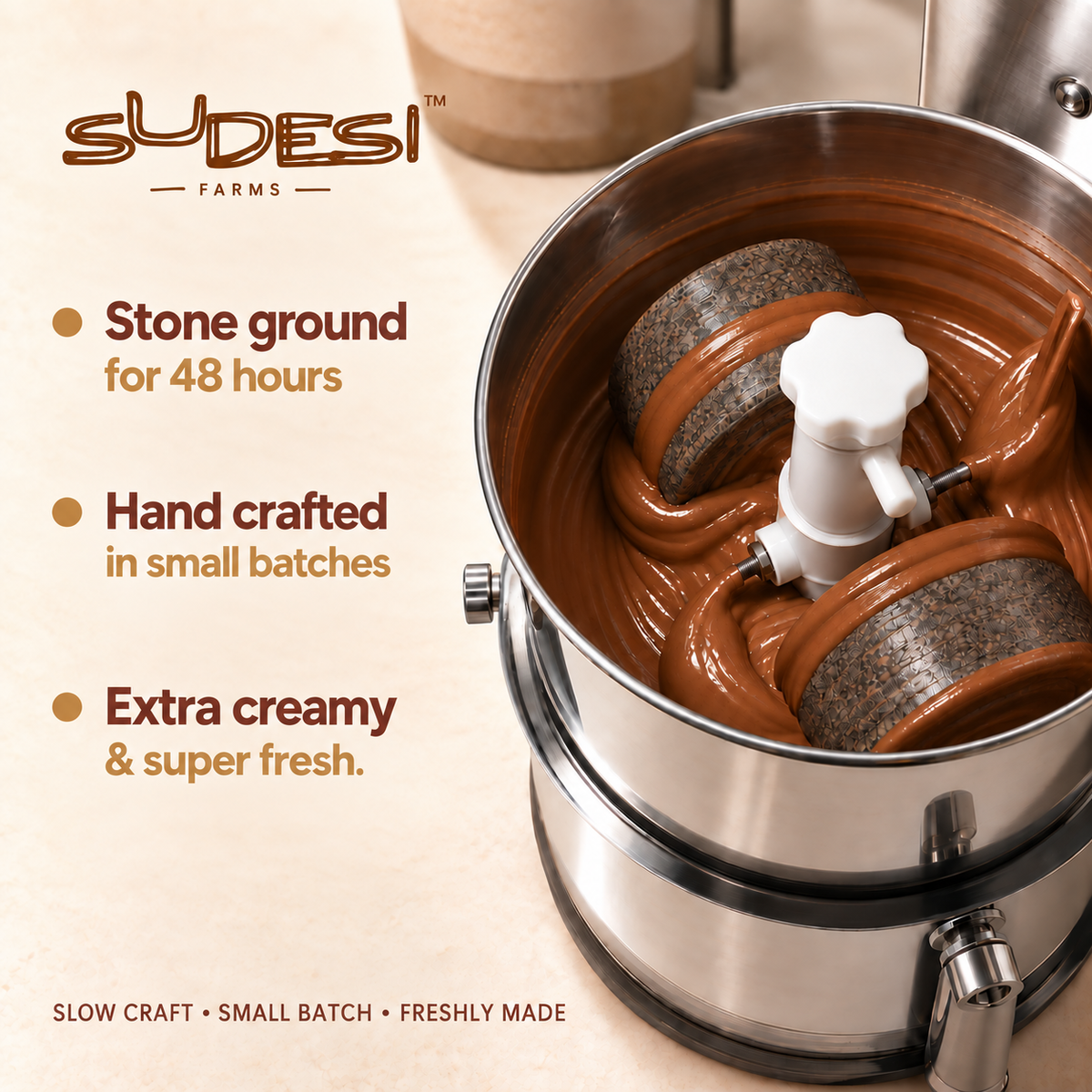 A close-up of a Sudesi Farms slow-craft stone grinder in action, showing that thick, creamy chocolate-brown ground chocolate spread is being produced. The image features marketing text on the left highlighting '48 hours' of stone grinding, handcrafted batches, and the extra creamy, fresh result.