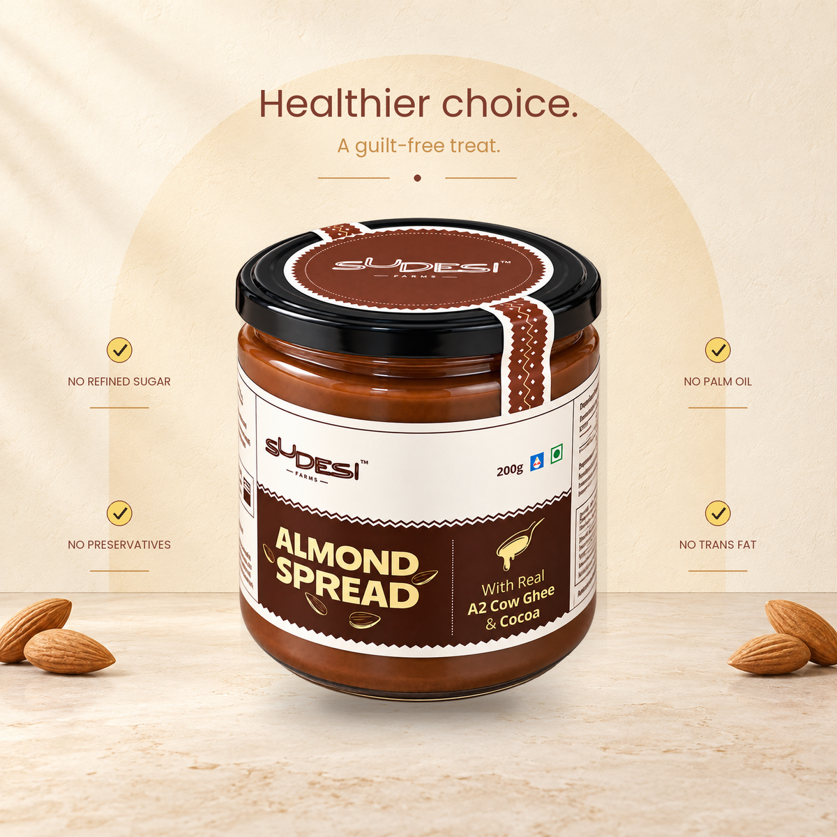 A jar of Sudesi Almond Spread is centered on a light beige background with decorative text and almonds at the bottom corners. The jar has a black lid with a brown and white label.