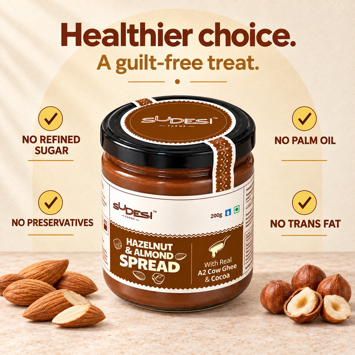 A jar of Sudesi Hazelnut & Almond Spread centered on a warm beige promotional background with text callouts about healthier ingredients. Almonds and hazelnuts are placed around the jar, and the product label is clearly visible. No palm oil, No trans fat, No refined sugar, No preservatives are written around the jar.